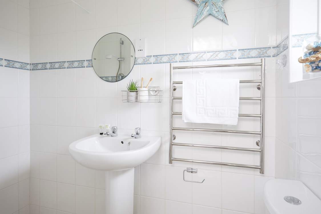 Rinse salty toes in the shower room.