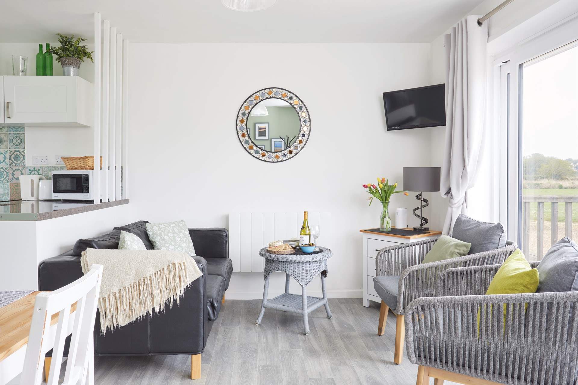 Your lovely lounge space looks towards your outside terraces and nature reserve beyond. 