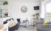 Your lovely lounge space looks towards your outside terraces and nature reserve beyond.  - Thumbnail Image