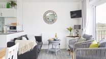 Your lovely lounge space looks towards your outside terraces and nature reserve beyond. 