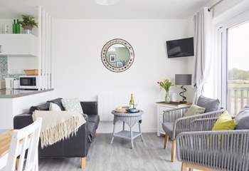 Your lovely lounge space looks towards your outside terraces and nature reserve beyond. 