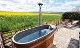 Sink into the wood-fired hot tub and simply let your worries melt away. - Thumbnail Image