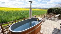 Sink into the wood-fired hot tub and simply let your worries melt away.