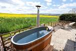 Sink into the wood-fired hot tub and simply let your worries melt away.