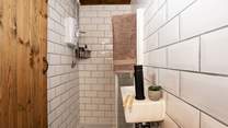 The en suite shower-room is perfect for freshening up after a day of adventures. 