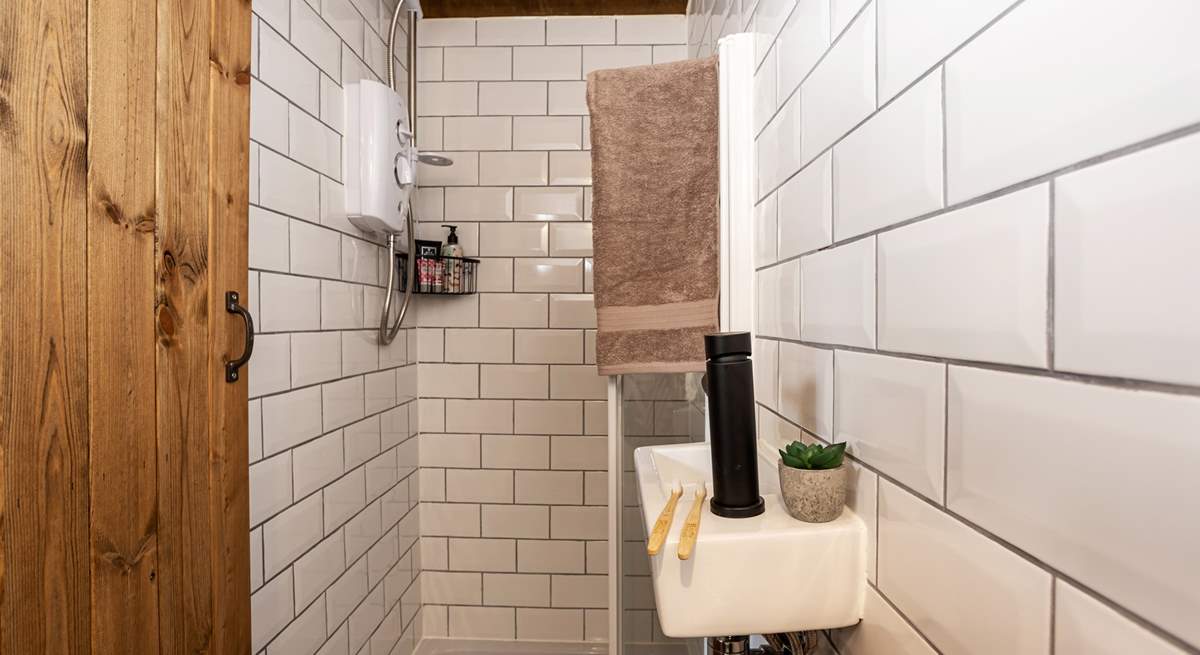 The en suite shower-room is perfect for freshening up after a day of adventures. 