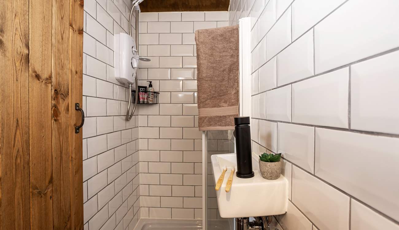 The en suite shower-room is perfect for freshening up after a day of adventures. 