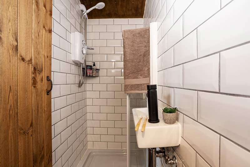 The en suite shower-room is perfect for freshening up after a day of adventures. 