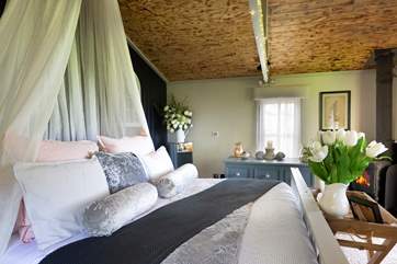 There's a cosy wood-burner and underfloor heating to keep you toasty, no matter the season.