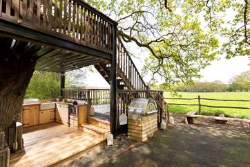 The quirky kitchen area sits just in front, where you'll also find the wood-fired pizza oven.