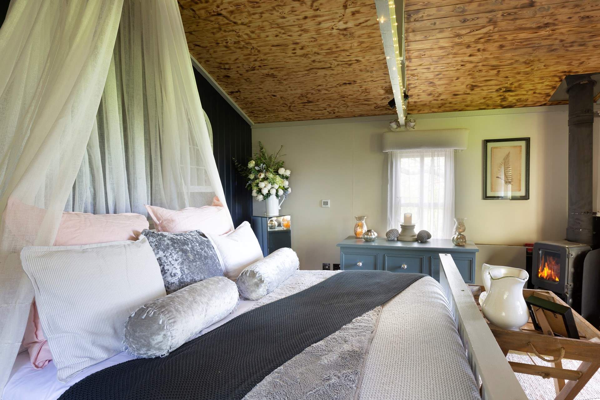 There's a cosy wood-burner and underfloor heating to keep you toasty, no matter the season. 