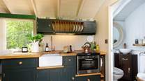 The beautifully finished shower-room in situated to the right of the hideaway.