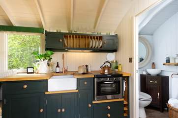 The beautifully finished shower-room in situated to the right of the hideaway.