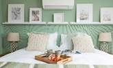 Island bedroom is a beautiful sage green and enjoys a sea view towards Lundy Island. - Thumbnail Image