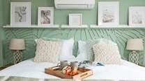 Island bedroom is a beautiful sage green and enjoys a sea view towards Lundy Island.