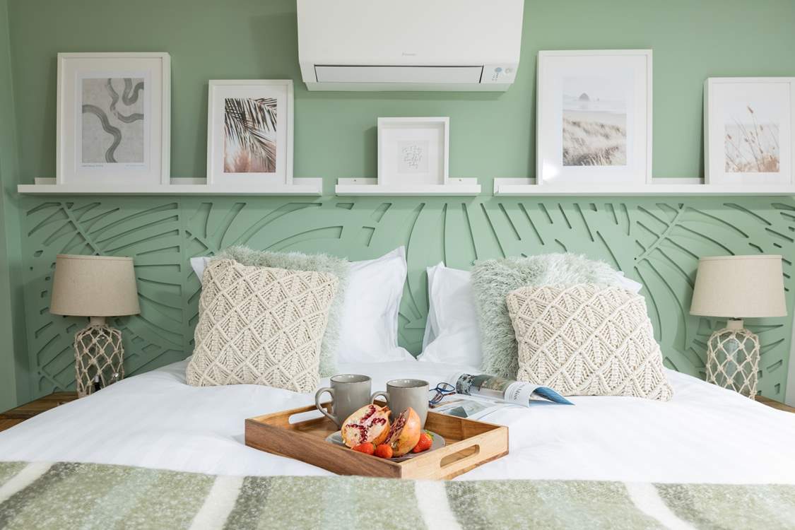 Island bedroom is a beautiful sage green and enjoys a sea view towards Lundy Island.