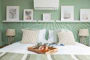 Island bedroom is a beautiful sage green and enjoys a sea view towards Lundy Island.