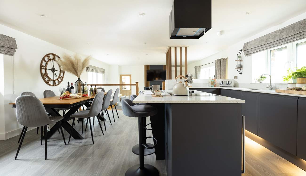 Take a pew at the breakfast-bar or for more formal dining...