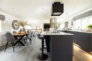Take a pew at the breakfast-bar or for more formal dining...