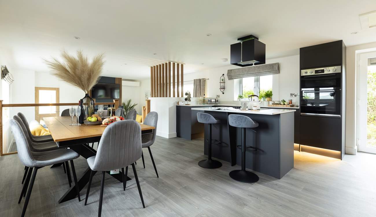 A stylish open plan living-room awaits.