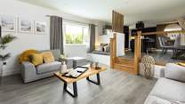 The sitting-area is comfortably furnished and includes a cosy reading nook.