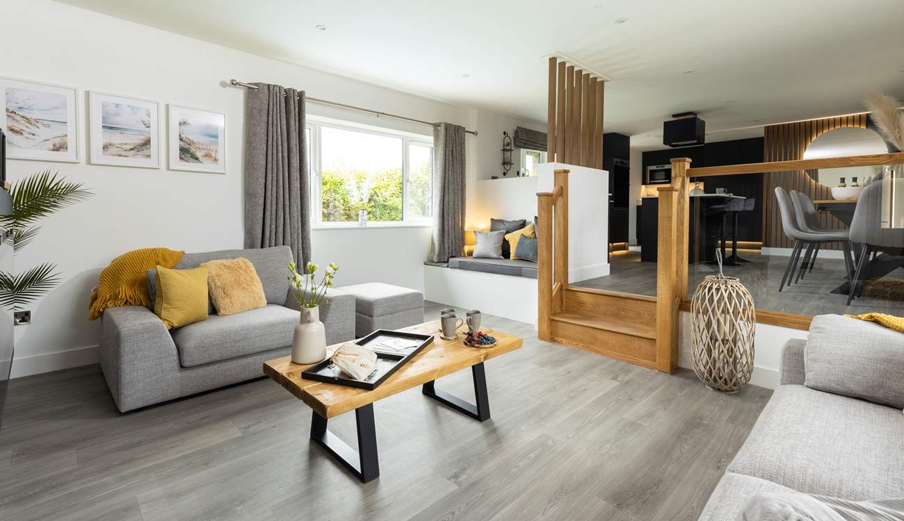 The sitting-area is comfortably furnished and includes a cosy reading nook.