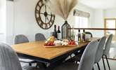 There's the large dining-table for all to gather around. - Thumbnail Image