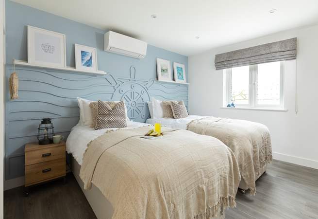 The nautically-themed Ocean bedroom with twin beds.