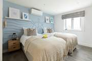 The nautically-themed Ocean bedroom with twin beds.