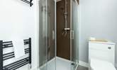 Each bedroom enjoys a modern en suite with a shower and heated towel rail. - Thumbnail Image