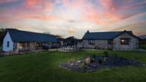 A warm welcome awaits!
White Coast is a property for all the family to enjoy as well as the dog. The garden sits to the front of the house. 