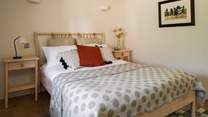 Bedroom one is cute and compact.