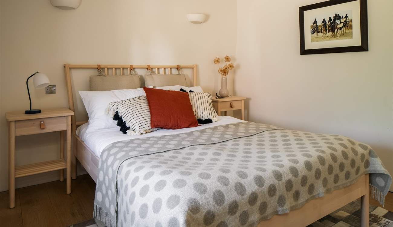 Bedroom one is cute and compact.