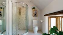 The family bathroom is equipped with a shower cubicle.