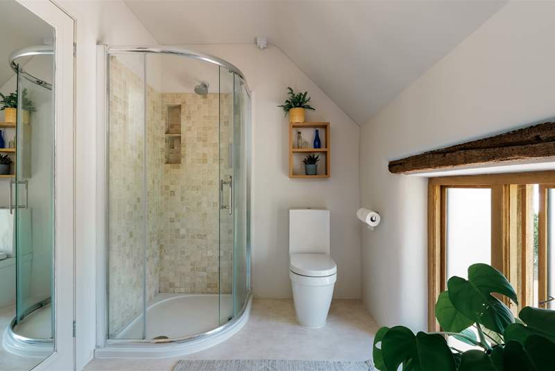 The family bathroom is equipped with a shower cubicle.