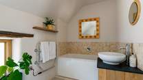 The family bathroom is equipped with a bath too, perfect for soaking away the days sand and suncream.