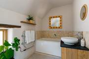 The family bathroom is equipped with a bath too, perfect for soaking away the days sand and suncream.