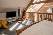 Bedroom three offers the option of TV in bed.