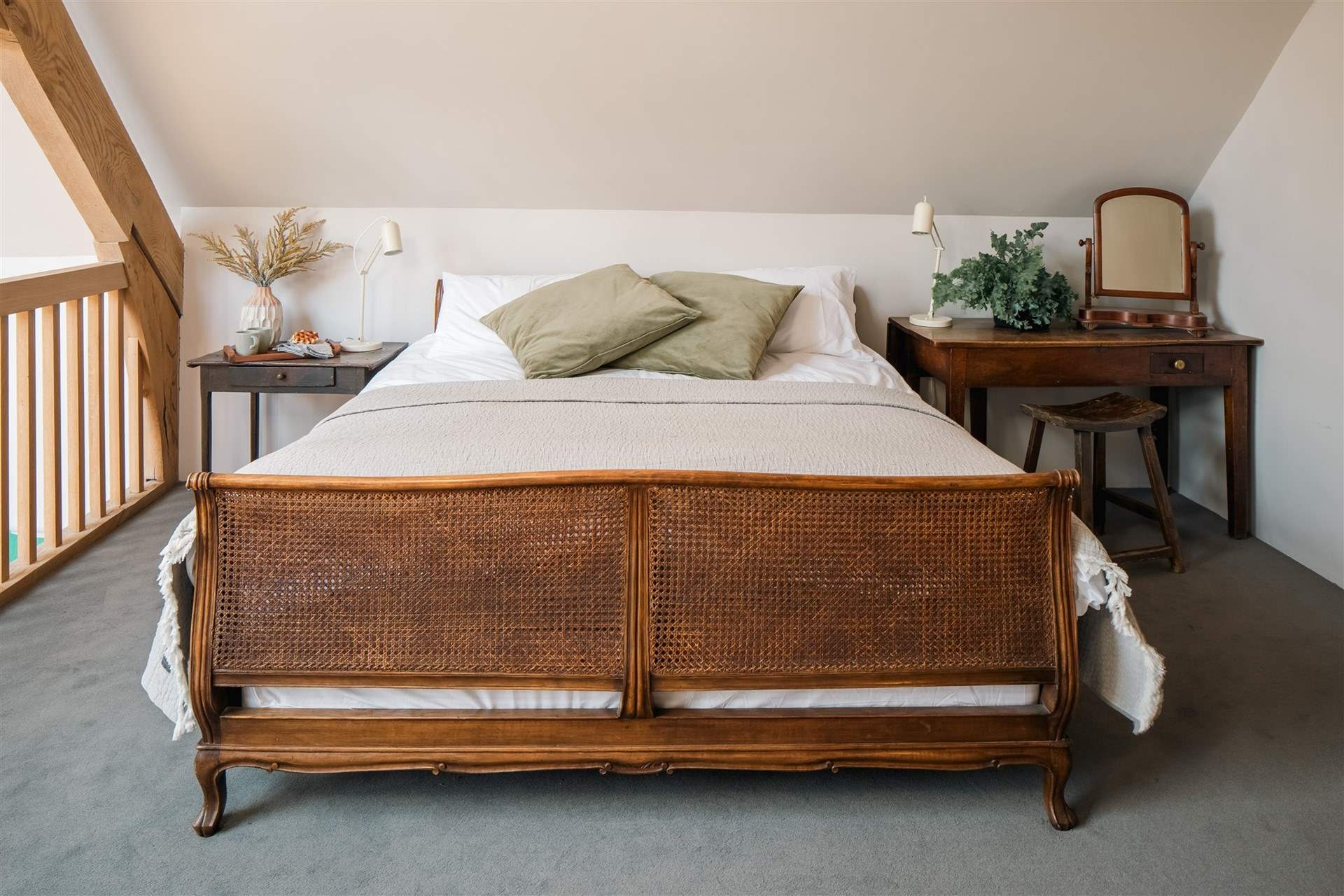 Bedroom three is on the mezzanine level. Please be mindful of the sloping ceiling.