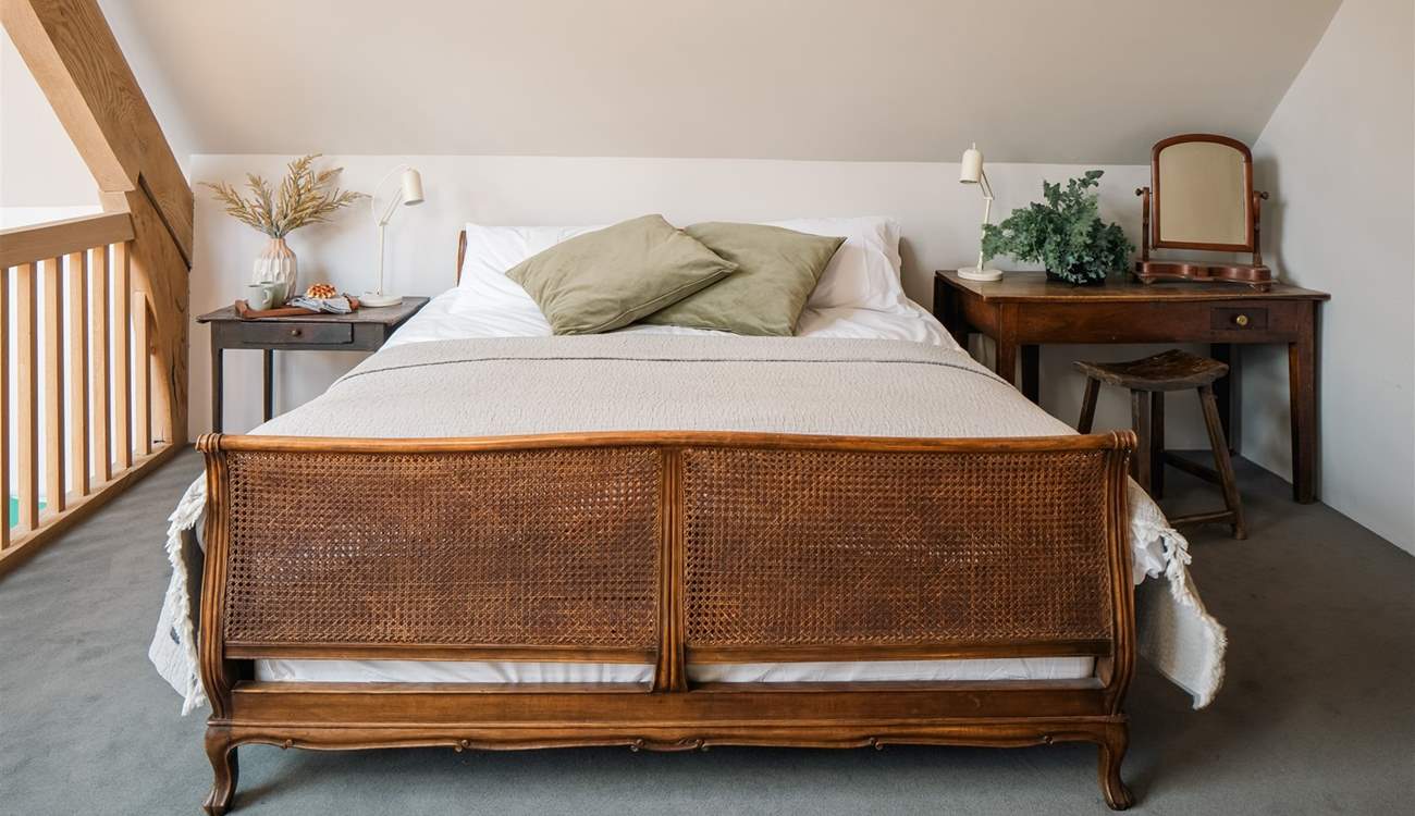 Bedroom three is on the mezzanine level. Please be mindful of the sloping ceiling.