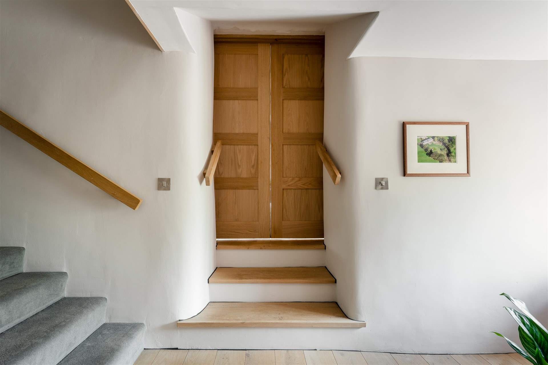 Go through the living room doors, down three steps and you are on the lower ground floor, where you will find bedroom one.