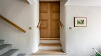 Go through the living room doors, down three steps and you are on the lower ground floor, where you will find bedroom one.
