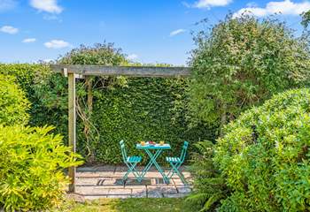This magical little spot for two is tucked away at the bottom of the garden. Perfect for hiding away with the morning paper.