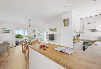 Open plan kitchen and dining area, which leads into the conservatory.