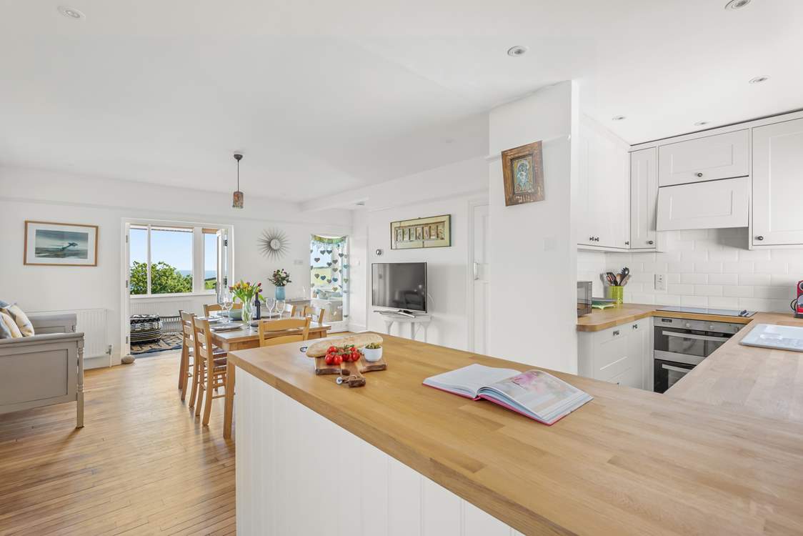 Open plan kitchen and dining area, which leads into the conservatory.