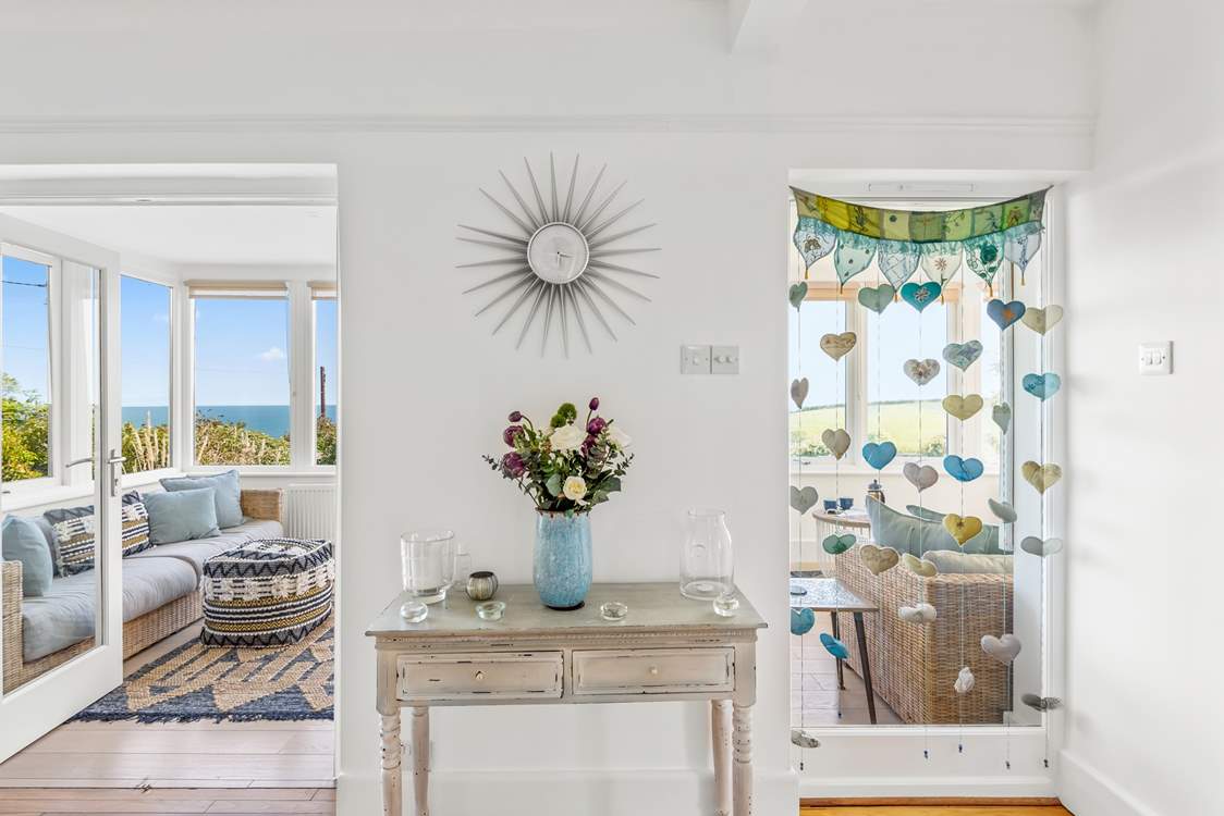 Step into the conservatory from the kitchen and dining area.