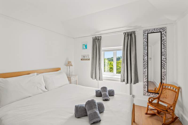 Bedroom three is home to this lovely double bed and wonderful countryside views.