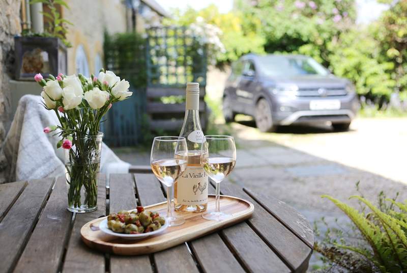 Private parking in the tranquil courtyard garden.