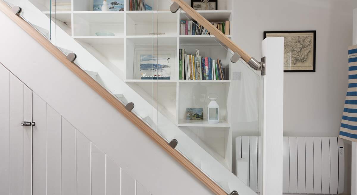 The stylish staircase leads to the first floor.