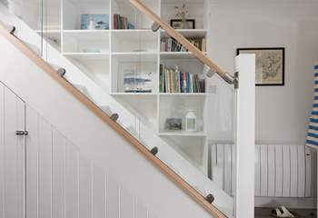 The stylish staircase leads to the first floor.